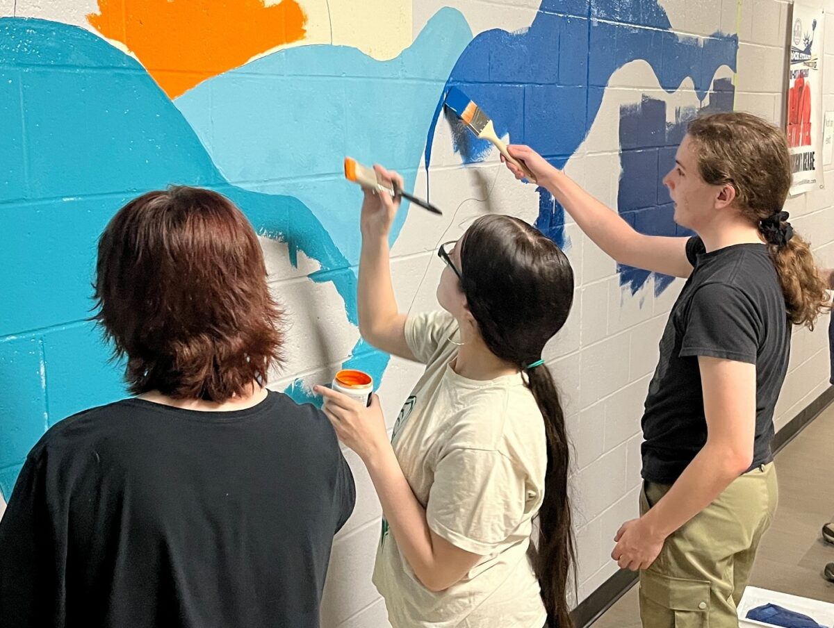 Volunteer Painters Complete Vibrant Scenic Mural in James W. Foley Memorial Community Center